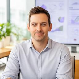 Declan Benson, data scientist, seated in a bright Singapore office